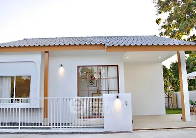 Charming modern white house with stylish roof and inviting entrance