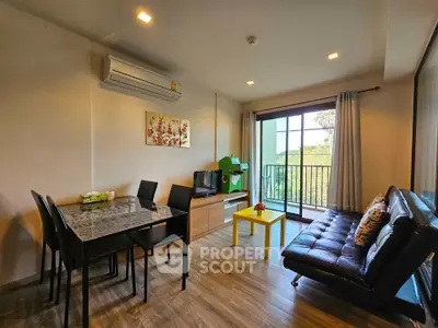Modern living room with balcony view and stylish furniture