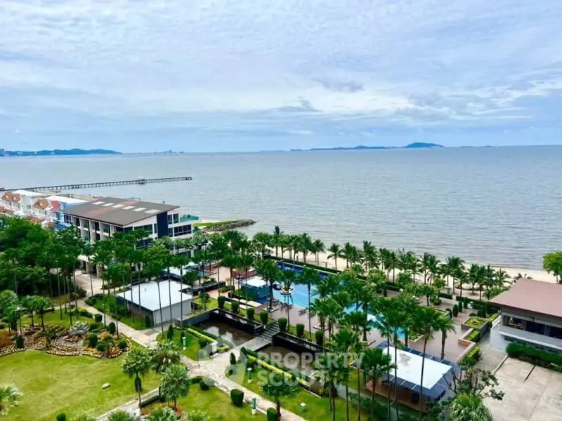 Stunning beachfront property with lush gardens and panoramic ocean views, perfect for luxury living.