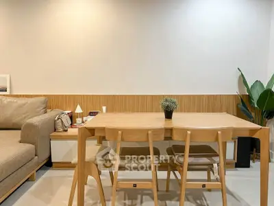 Modern living room with wooden furniture and cozy sofa