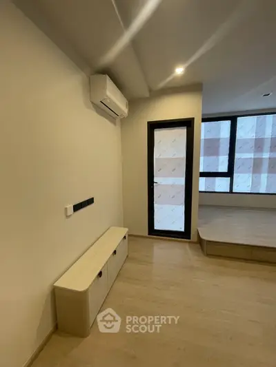 Modern minimalist interior with air conditioning and natural light