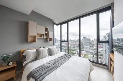 Luxurious bedroom with panoramic city view and modern decor