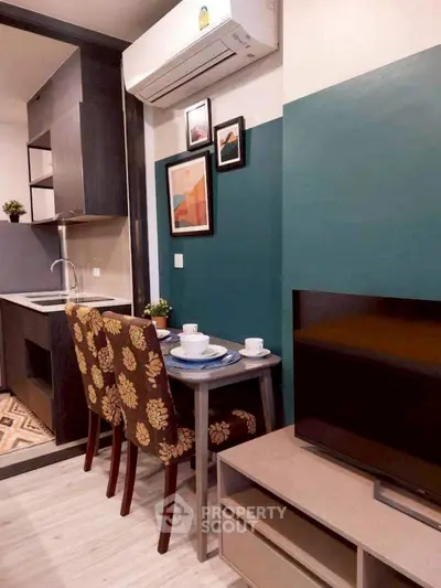 Chic compact living space with modern kitchen and stylish decor