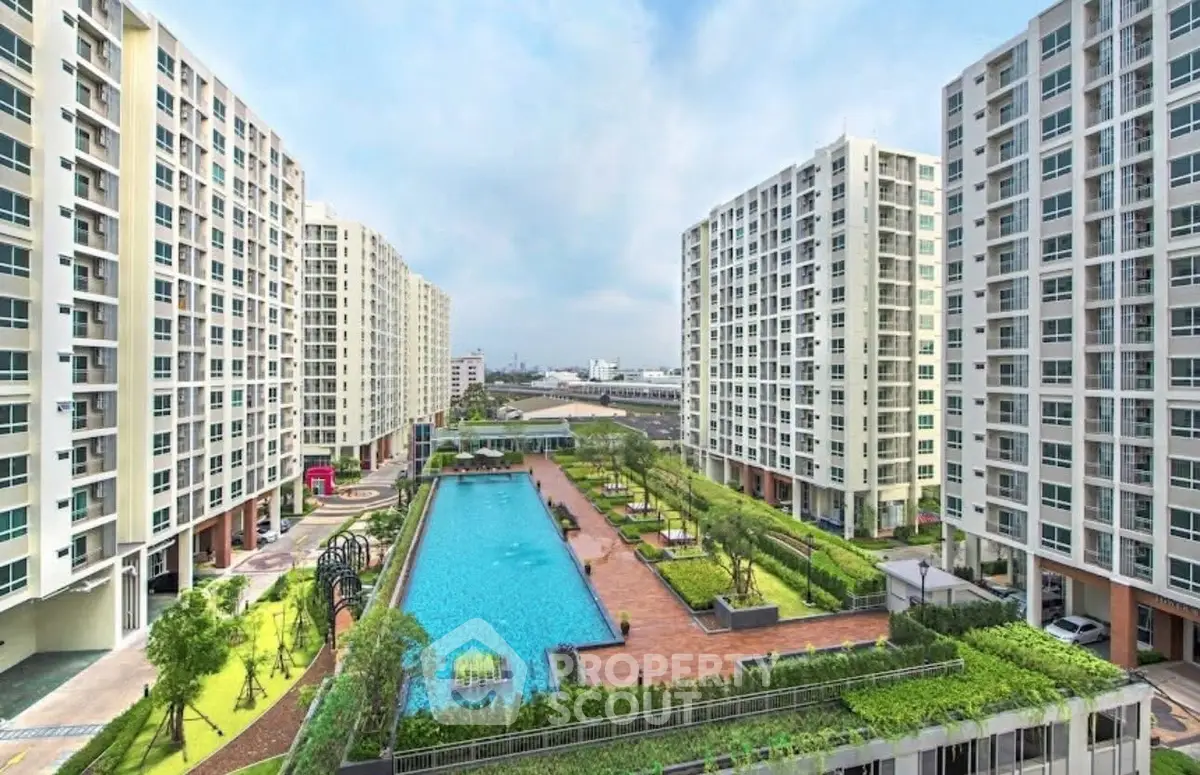 Luxurious residential complex with stunning pool and landscaped gardens