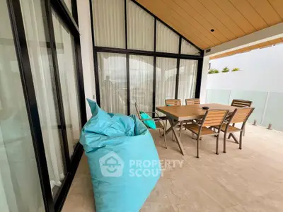 Spacious balcony with modern furniture and stylish design