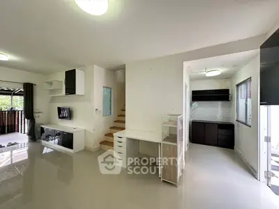 Spacious modern living room with open layout and natural light