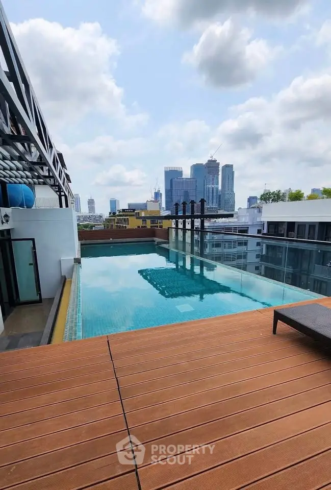 Stunning rooftop pool with city skyline views, perfect for luxury urban living.