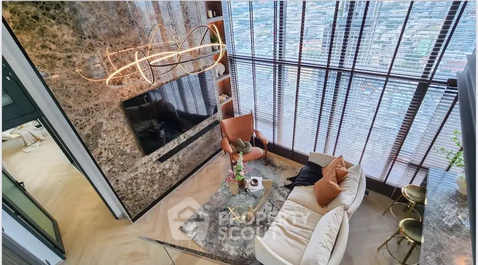 Luxurious modern living room with floor-to-ceiling windows and elegant decor