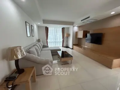 Spacious modern living room with elegant decor and large sectional sofa