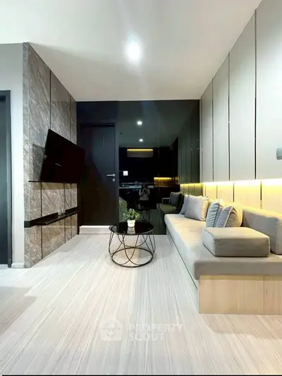 Modern living room with sleek design, cozy seating, and stylish decor.