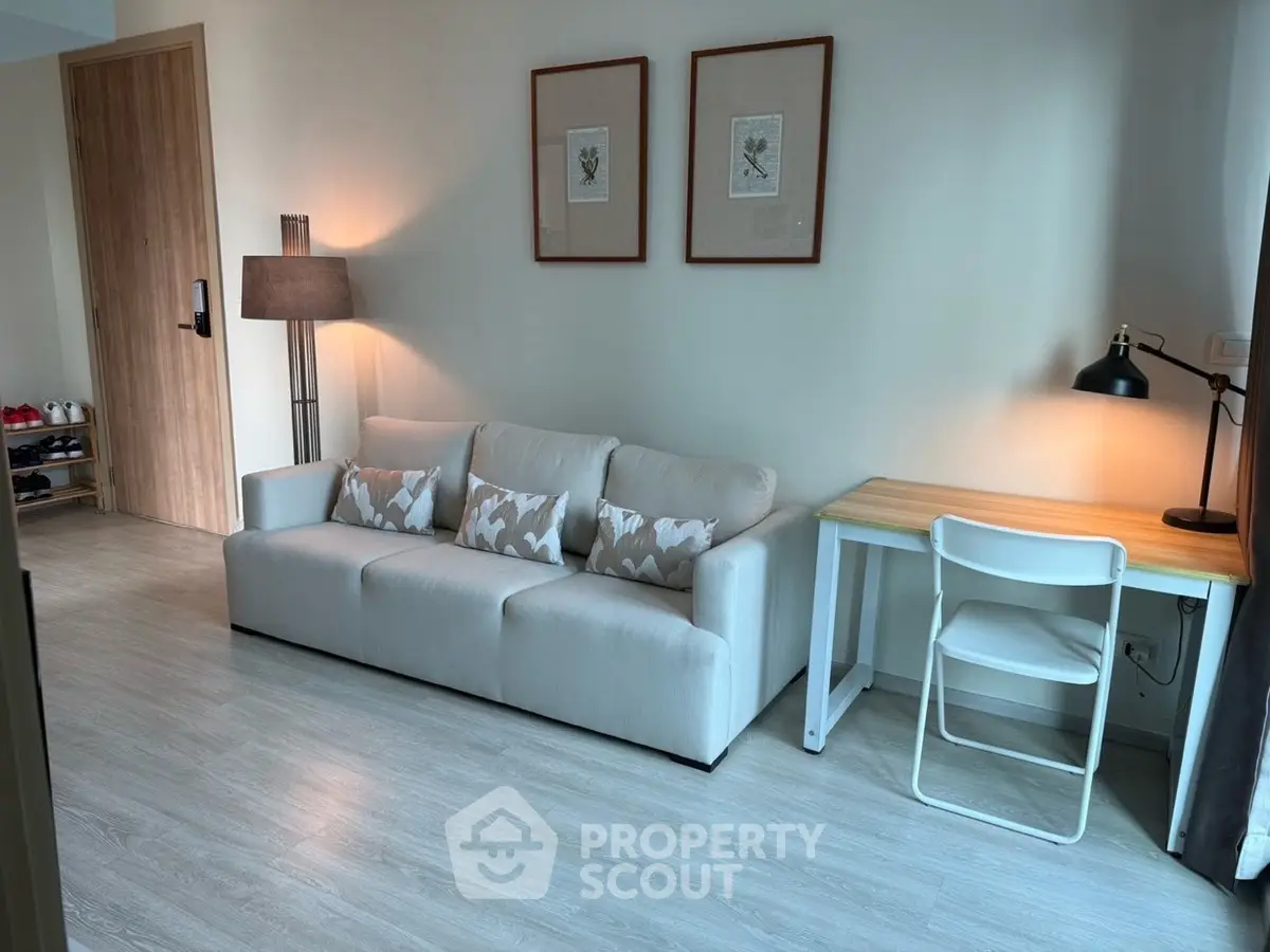 Modern living room with cozy sofa and stylish desk setup