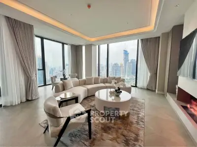 Luxurious high-rise living room with panoramic city views and elegant furnishings.