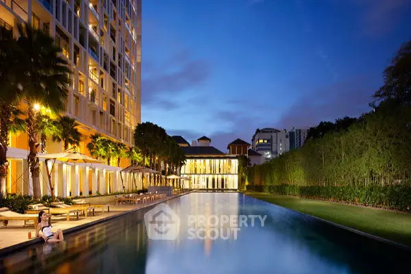 Luxurious beachfront property with stunning sunset view and modern architecture.