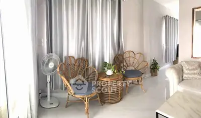 Charming living room with elegant wicker chairs and modern decor