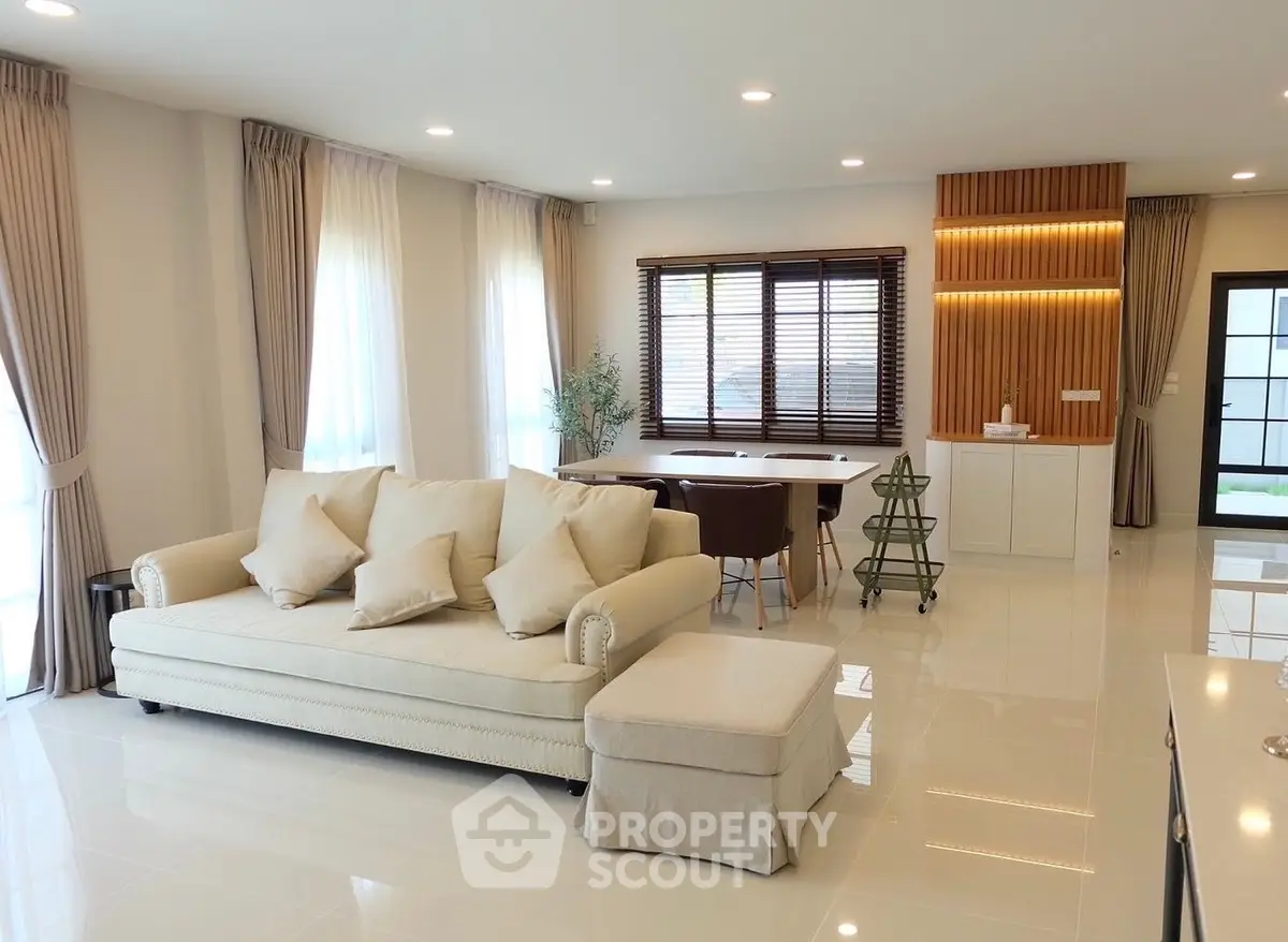 Spacious modern living room with elegant decor and natural light