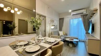 Modern living room with elegant dining area and stylish decor