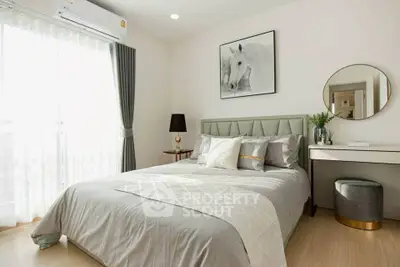 Elegant bedroom with modern decor and natural light