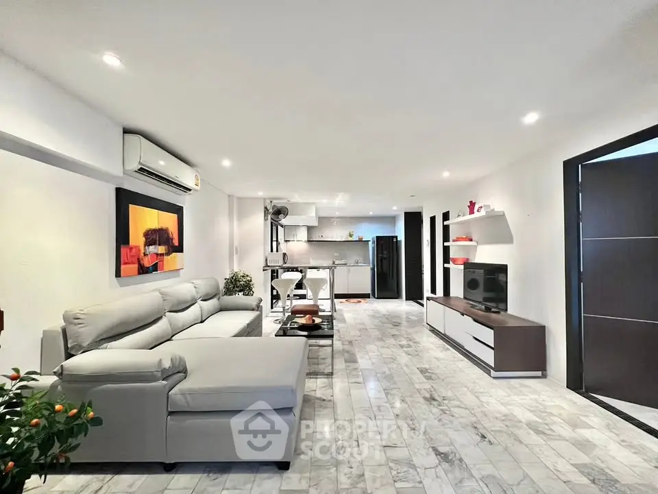 Spacious modern living room with open layout and stylish decor