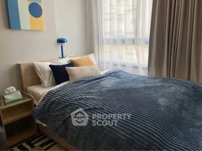 Cozy bedroom with modern decor and natural light