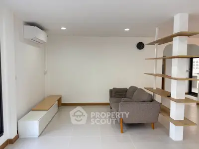 Modern living room with minimalist design and cozy sofa