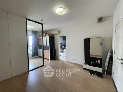 Spacious modern living room with sleek design and ample natural light