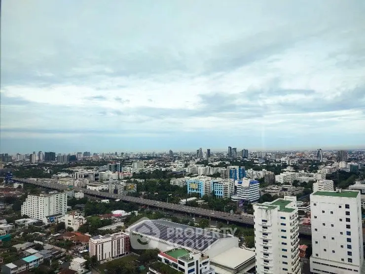 Stunning cityscape view from high-rise building showcasing urban skyline and expansive horizon.