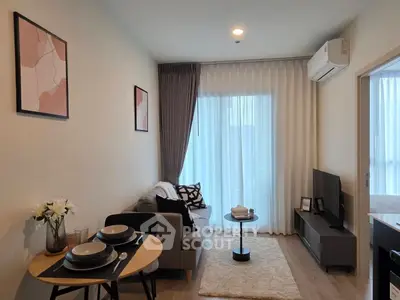 Modern living room with cozy decor and natural light