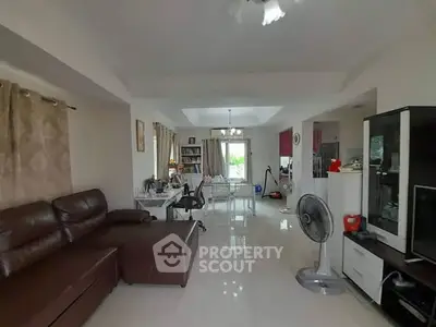 Spacious living room with modern furniture and natural light