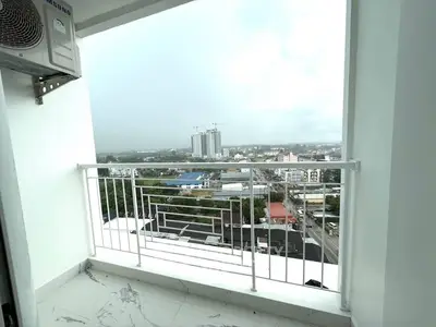 Stunning balcony view with cityscape and modern railing design.