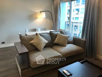 Modern living room with cozy sofa and stylish decor in urban apartment