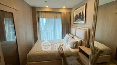 Cozy modern bedroom with city view, featuring elegant decor and natural light.
