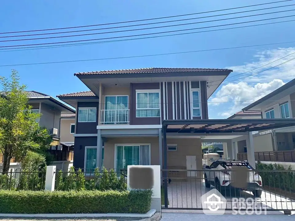 Modern two-story house with carport and landscaped front yard in a suburban neighborhood.