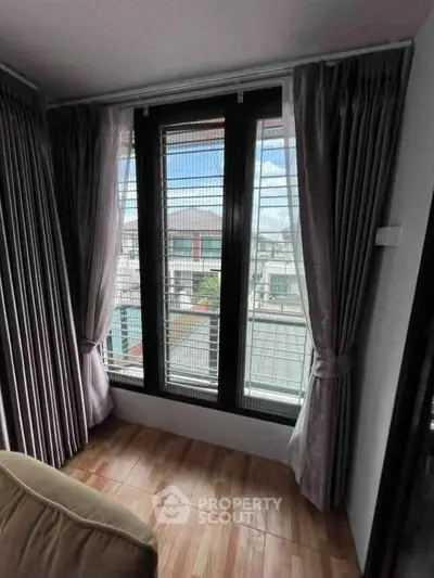 Cozy corner unit with large windows offering a great view of the neighborhood.