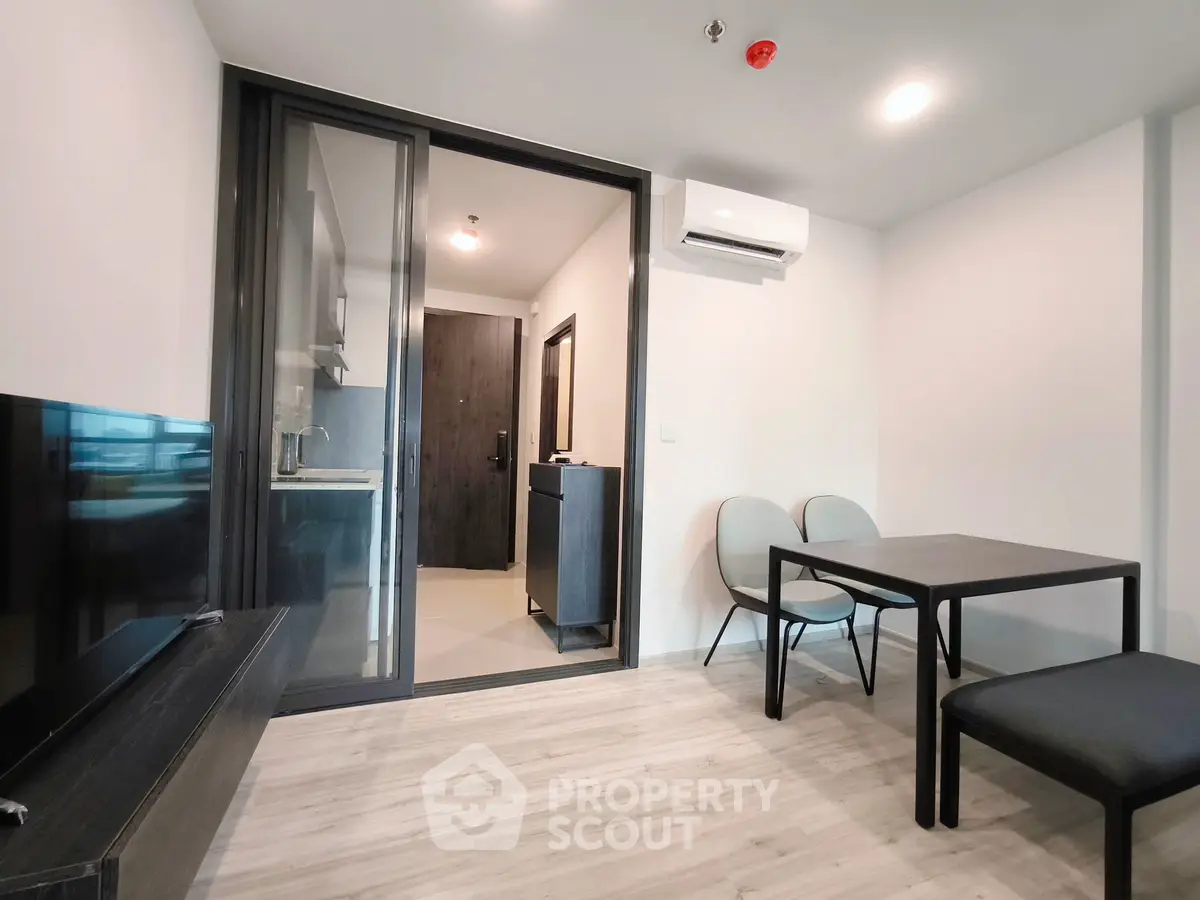 Modern apartment interior with open layout and sleek furniture