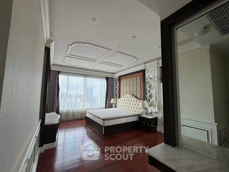 Luxurious bedroom with elegant decor and stunning city view