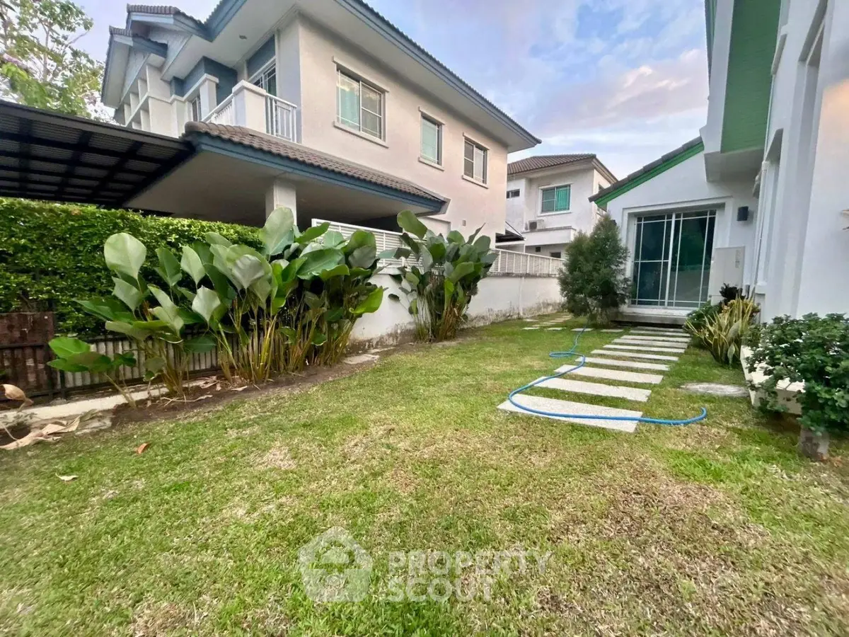 Charming suburban home with lush garden and modern exterior design