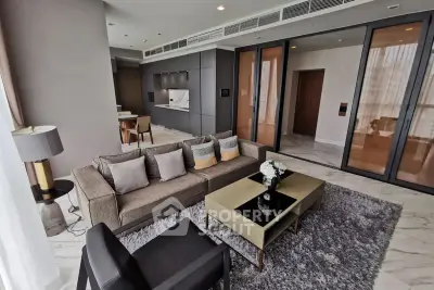 Luxurious modern living room with open kitchen and elegant decor