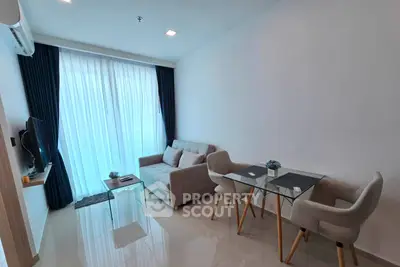 Modern living room with sleek furniture and natural light