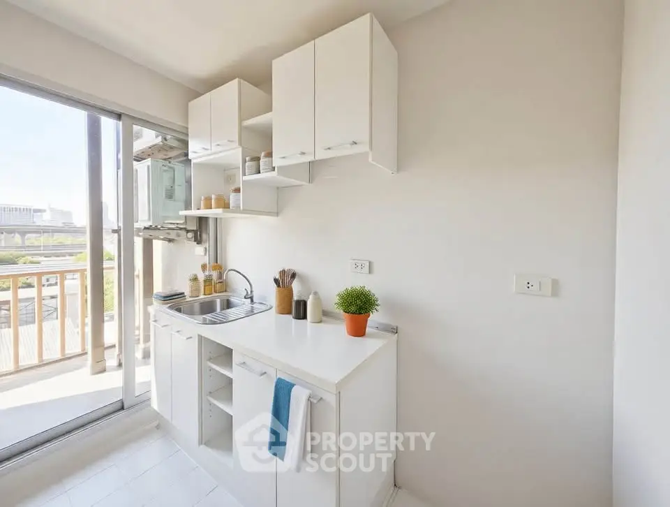 Bright modern kitchen with open layout and balcony view