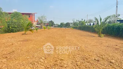 Expansive land plot ready for development in a serene neighborhood.