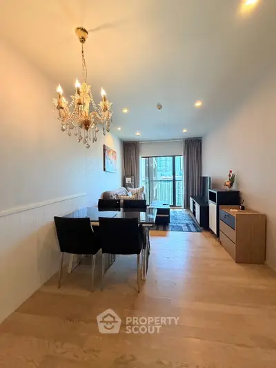 Spacious modern living room with elegant lighting and stylish decor