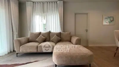 Elegant living room with plush beige sofa and modern decor