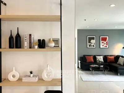 Modern living room with stylish decor and open shelving