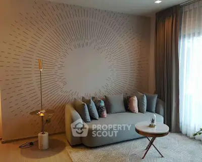 Stylish living room with modern sofa and artistic wall design