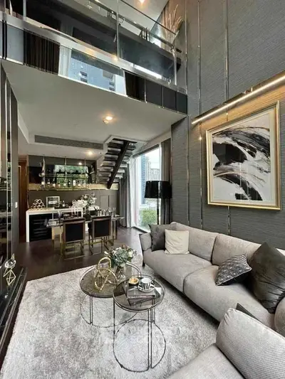 Luxurious modern living room with high ceilings and elegant decor