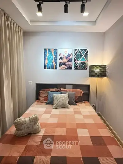 Cozy bedroom with modern decor and stylish lighting