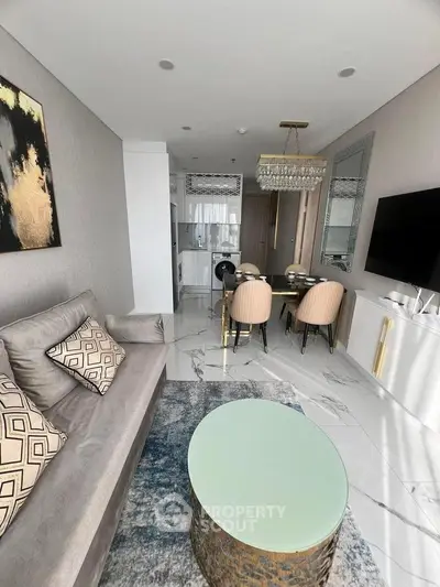Luxurious modern living room with elegant decor and open kitchen layout
