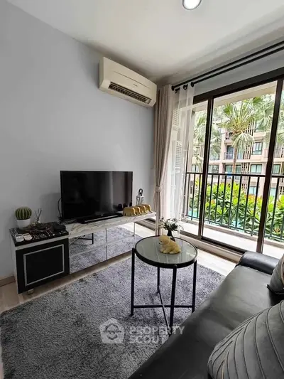 Modern living room with balcony view and stylish decor