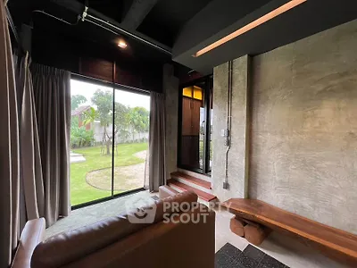 Modern living room with garden view and stylish interior design