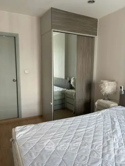 Cozy bedroom with modern wardrobe and stylish decor